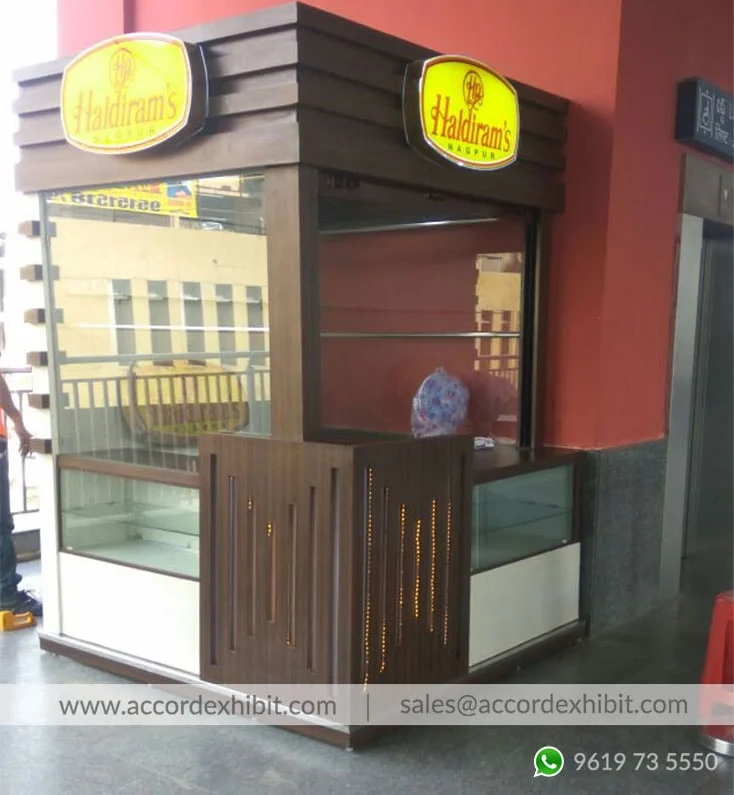 Retail kiosk exhibition stall at Mall & airport kiosk – designed & fabricated by Stall Fabricators