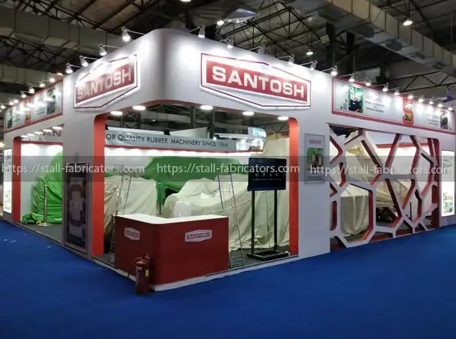 Santosh Rubber Machinery Pvt Ltd exhibition stall at India Rubber Expo – designed & fabricated by Stall Fabricators